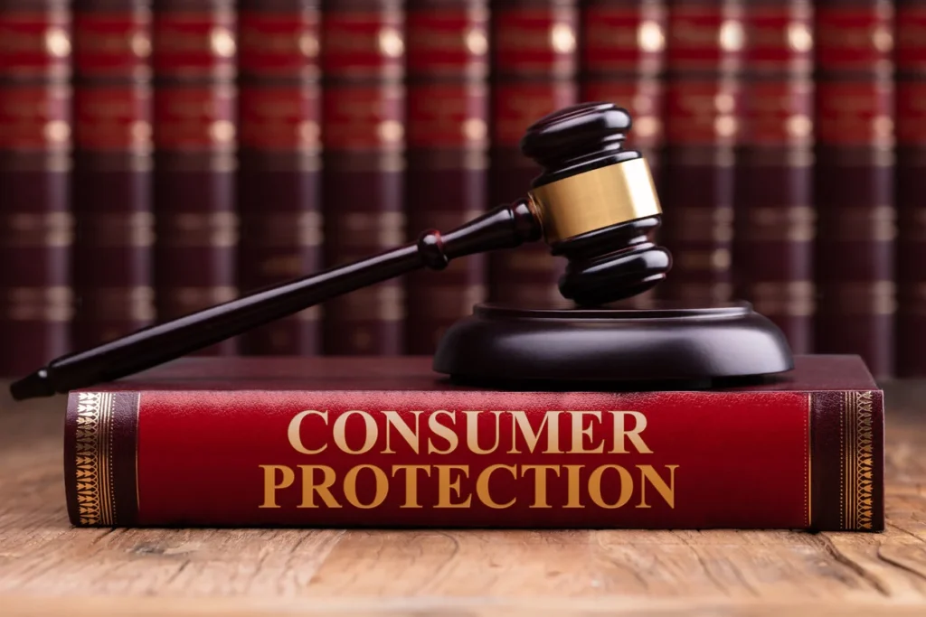 Gavel on a 'Consumer Protection' book, symbolizing consumer fraud and product liability law.